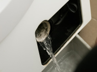Як злити воду з пральної машини